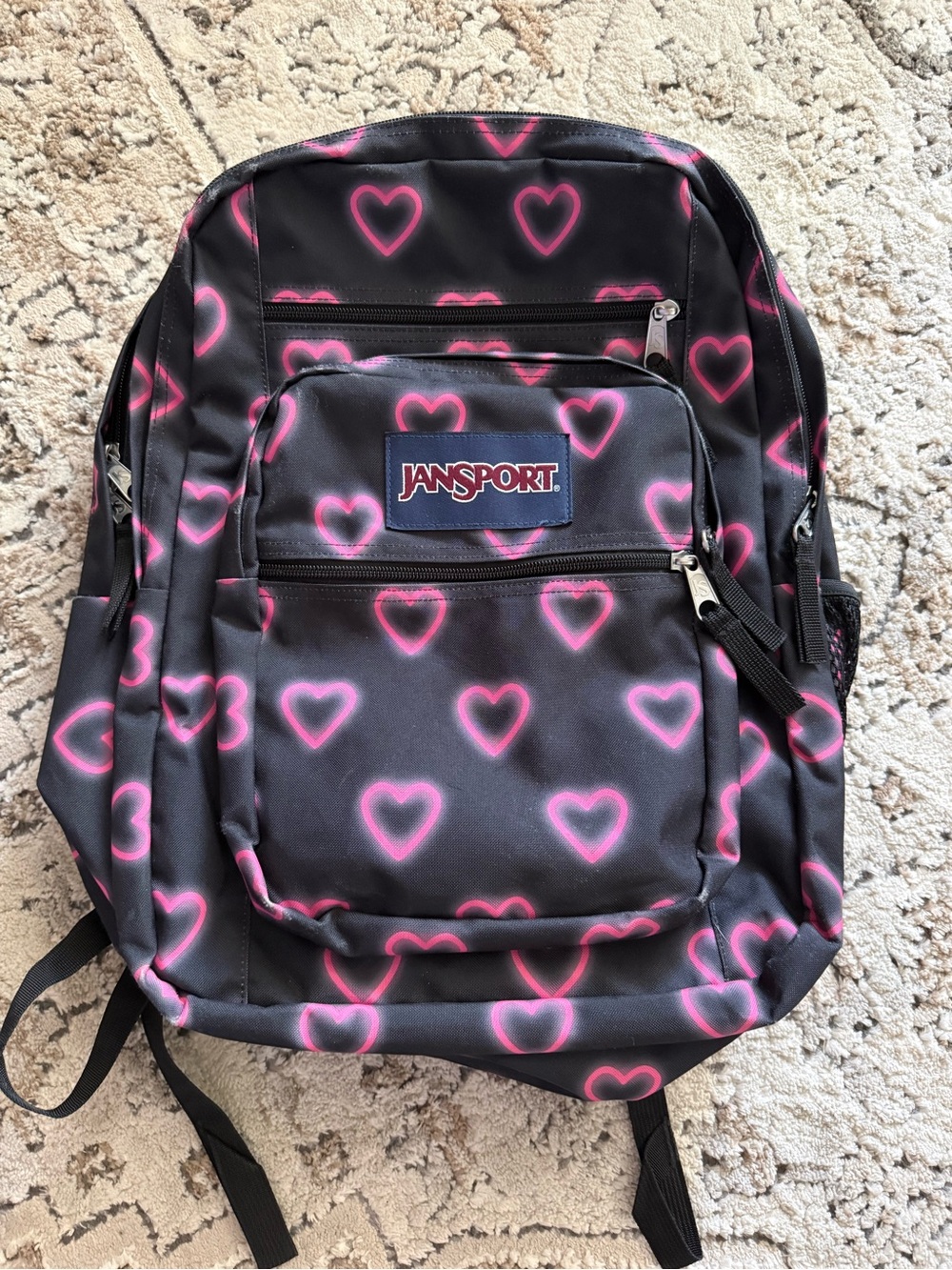 Jansport Black Backpack with Neon Pink Heart Pattern